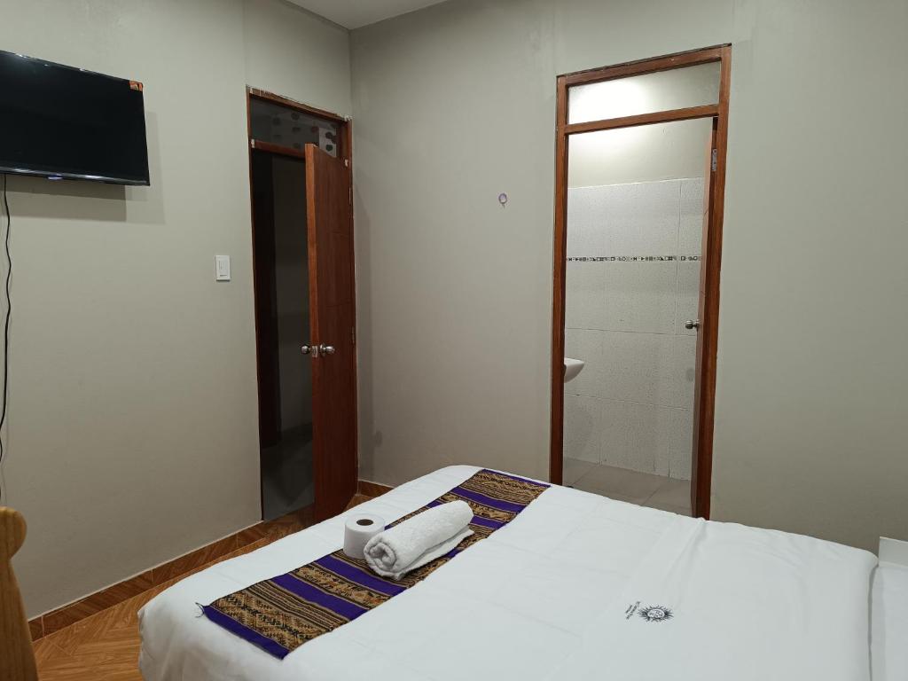 Postel nebo postele na pokoji v ubytování Hotel Chaska Illary Pisac