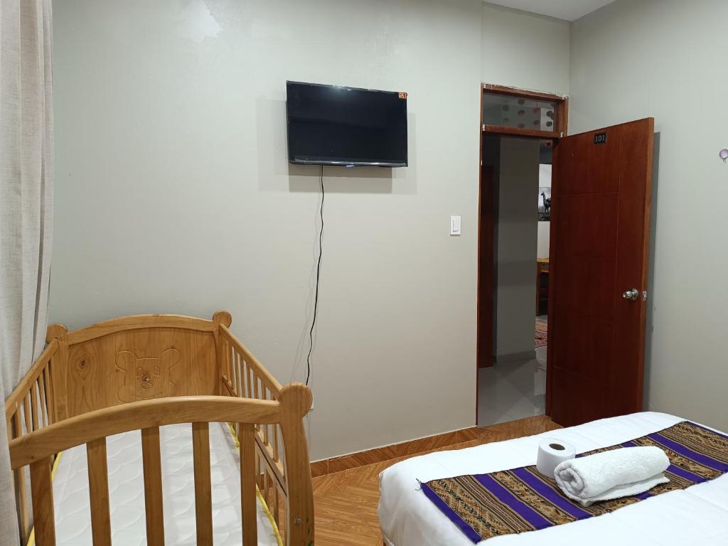 TV a/nebo společenská místnost v ubytování Hotel Chaska Illary Pisac