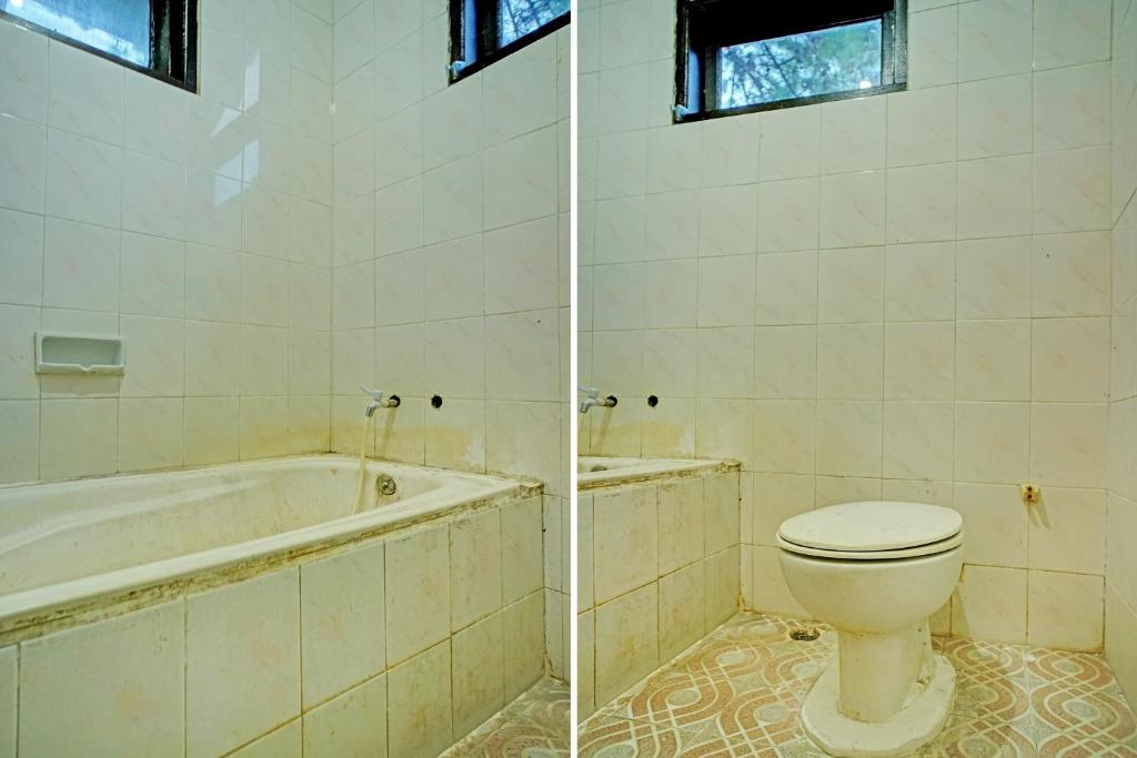 Koupelna v ubytování Capital O 92214 Beristera Hotel