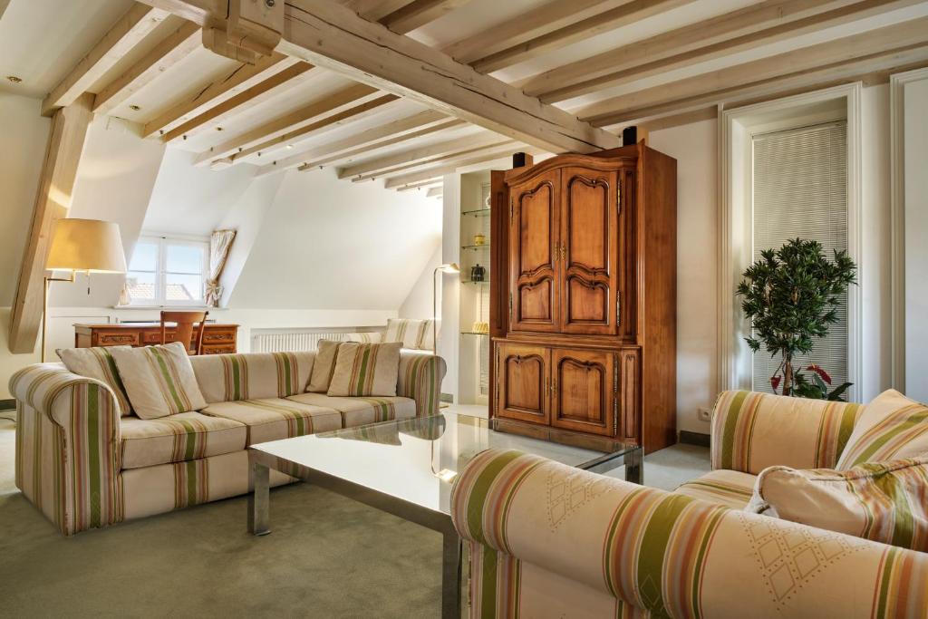 Posezení v ubytování Hotel & Spa A la cour d'Alsace by HappyCulture