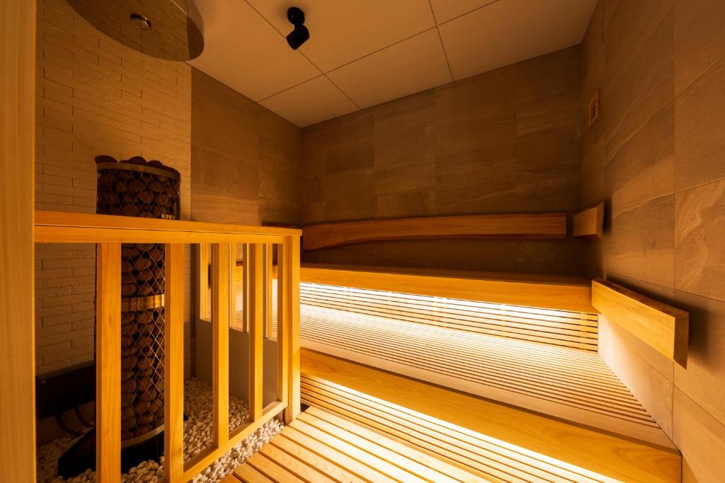 Palanda nebo palandy na pokoji v ubytování Hotel Meguri