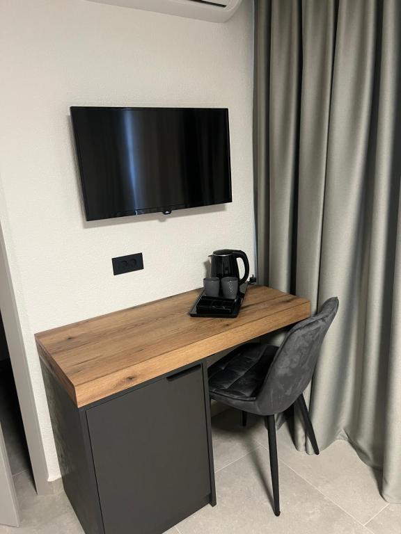 TV a/nebo společenská místnost v ubytování Villa Knezevic-completely renovated 2025