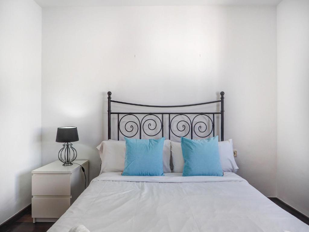 A bed or beds in a room at Zen Villa by Hello Homes Sitges