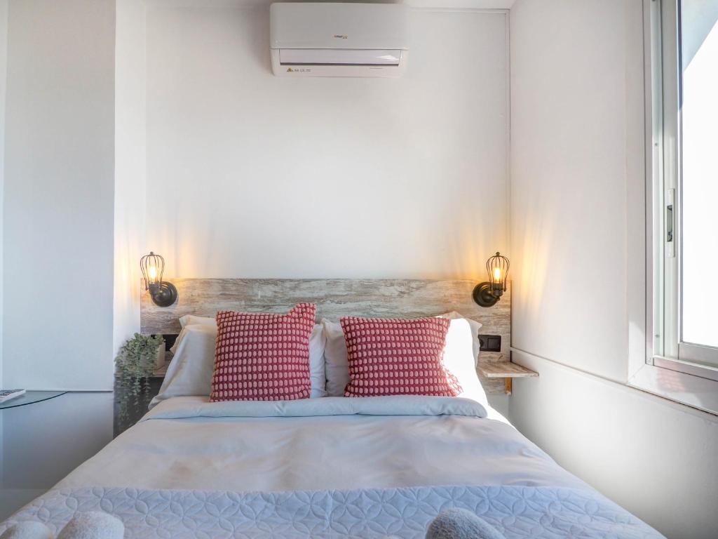 A bed or beds in a room at Zen Villa by Hello Homes Sitges
