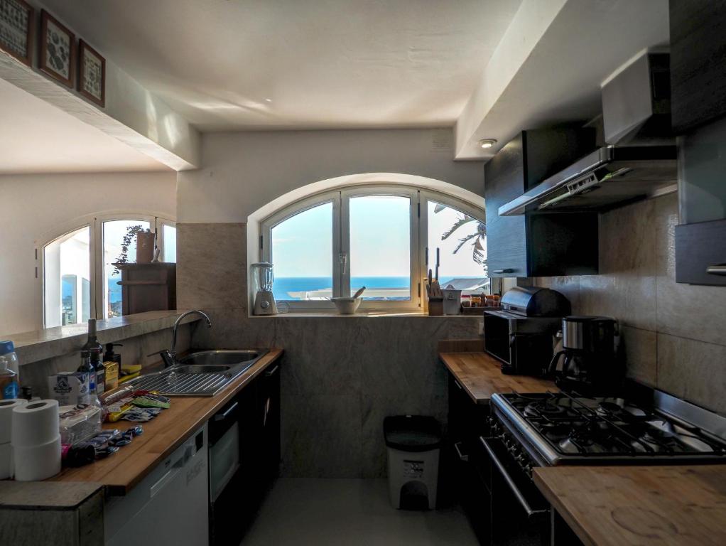 A kitchen or kitchenette at Zen Villa by Hello Homes Sitges