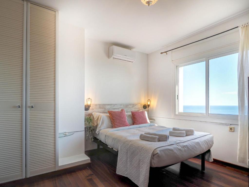 A bed or beds in a room at Zen Villa by Hello Homes Sitges