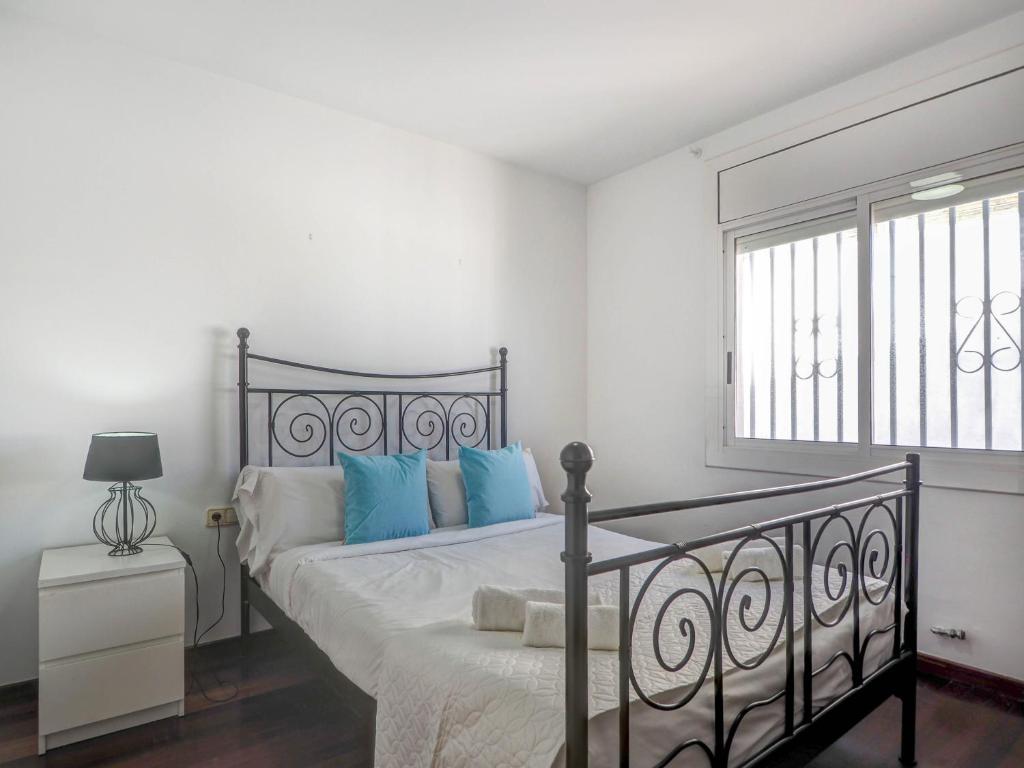 A bed or beds in a room at Zen Villa by Hello Homes Sitges