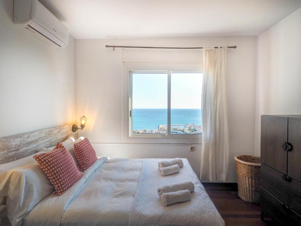 A bed or beds in a room at Zen Villa by Hello Homes Sitges