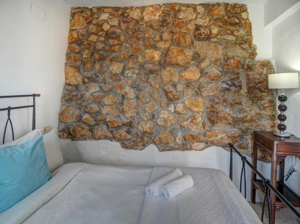 A bed or beds in a room at Zen Villa by Hello Homes Sitges