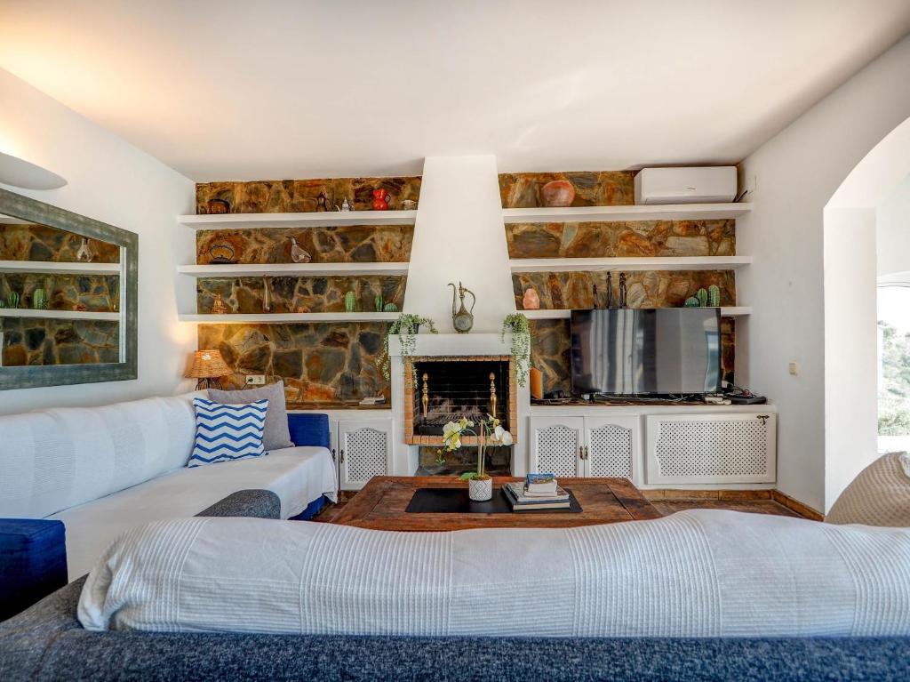 A bed or beds in a room at Zen Villa by Hello Homes Sitges