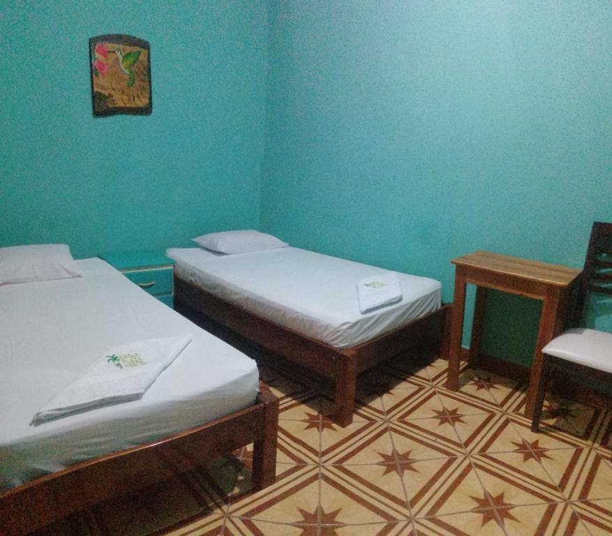 Postel nebo postele na pokoji v ubytování Plaza Jungle Hostel