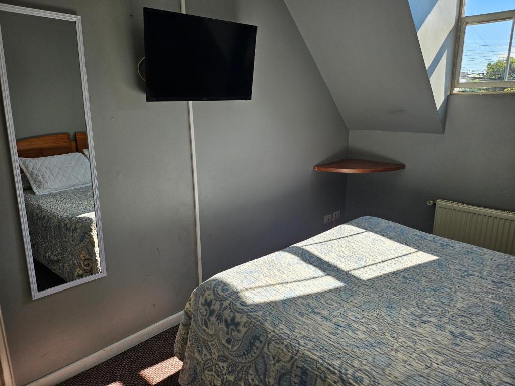 Postel nebo postele na pokoji v ubytování Apart Hotel Casablanca