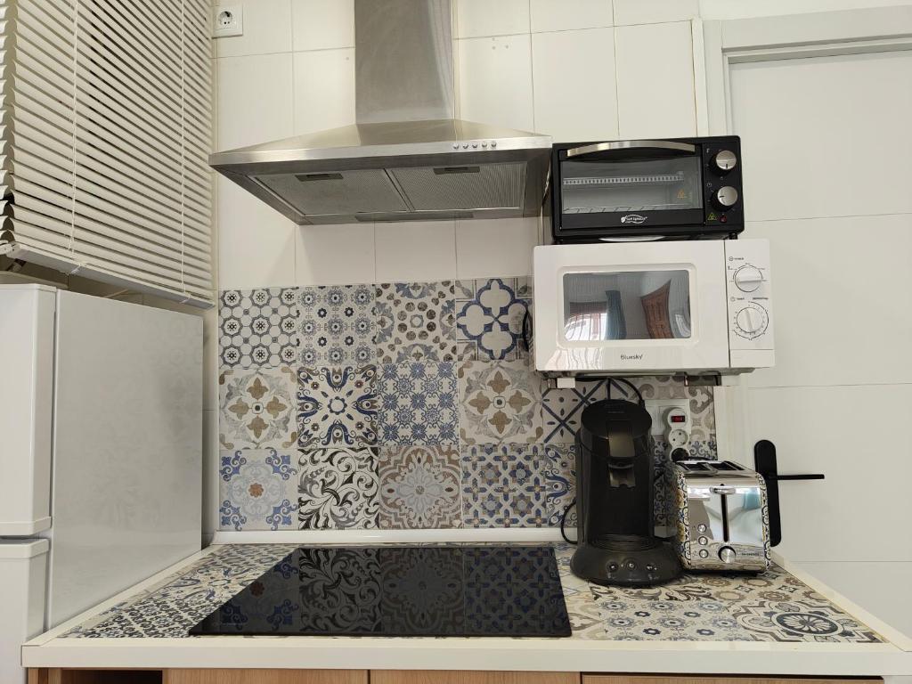 Kuchyňa alebo kuchynka v ubytovaní Apartamento Pepote