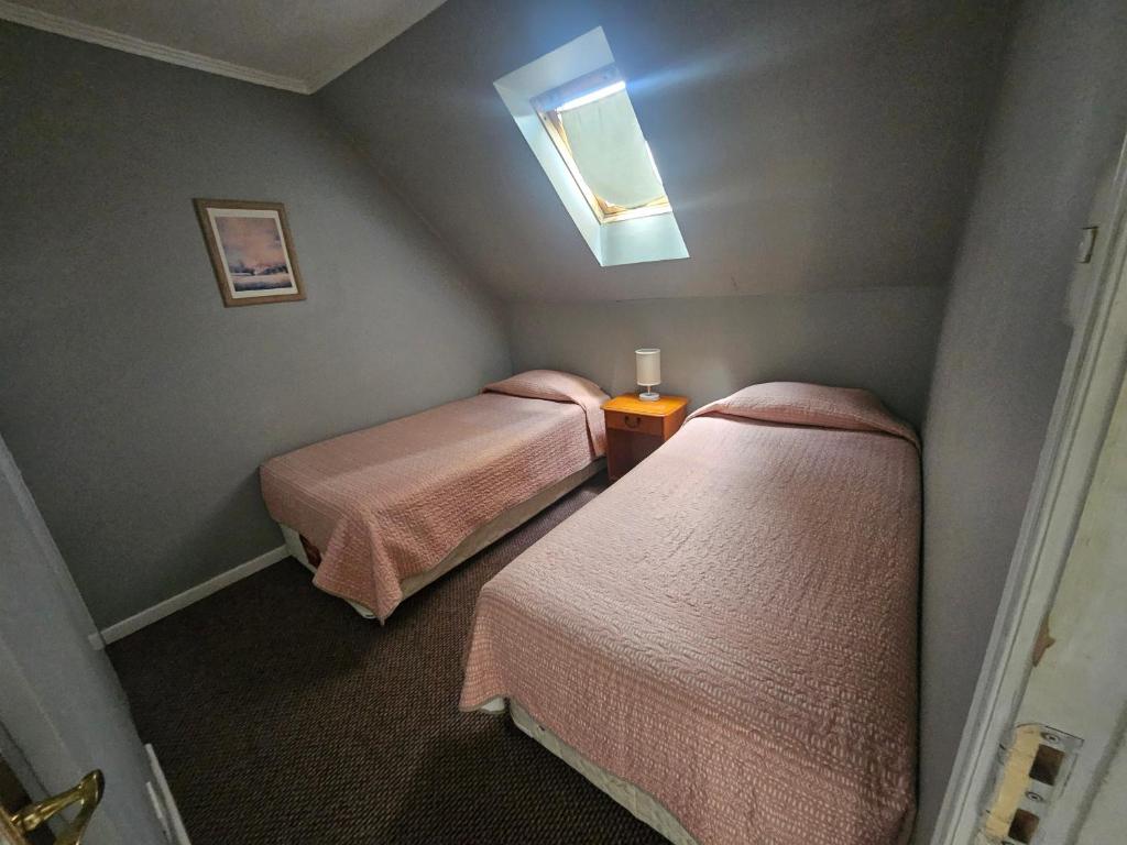Postel nebo postele na pokoji v ubytování Apart Hotel Casablanca