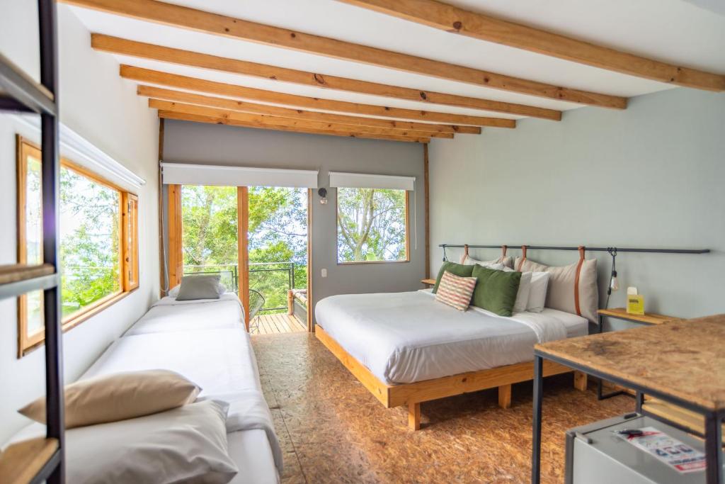 Postel nebo postele na pokoji v ubytování Hotel La Palma y El Tucán - Café y Naturaleza