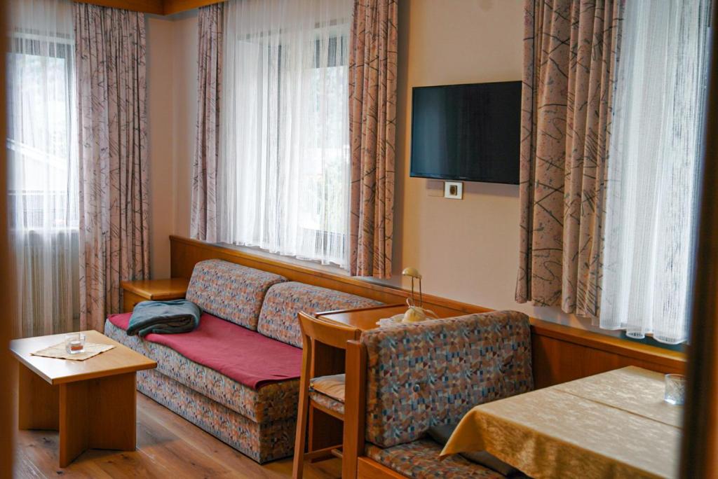 TV a/nebo společenská místnost v ubytování Appartements Residence Ganthaler