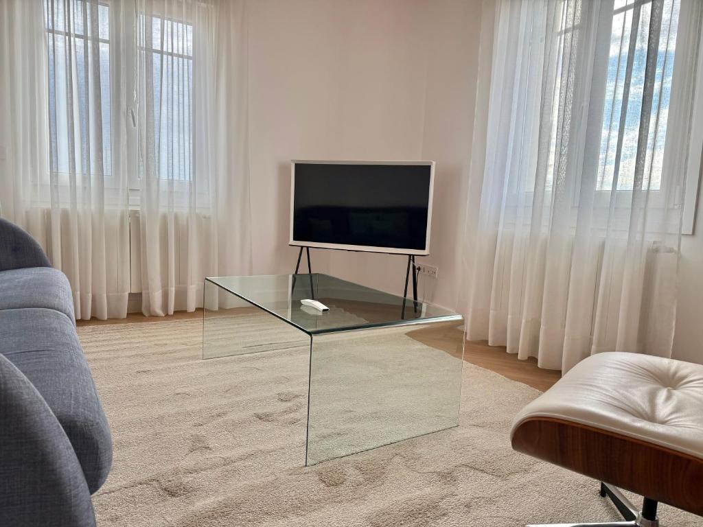 Televízia a/alebo spoločenská miestnosť v ubytovaní Señorial Panorámico by Exclusive Burgos Apartments