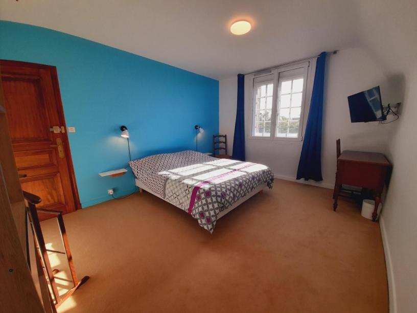 Postel nebo postele na pokoji v ubytování La Bonne Etoile - Chambres d'hôtes et Appartements -