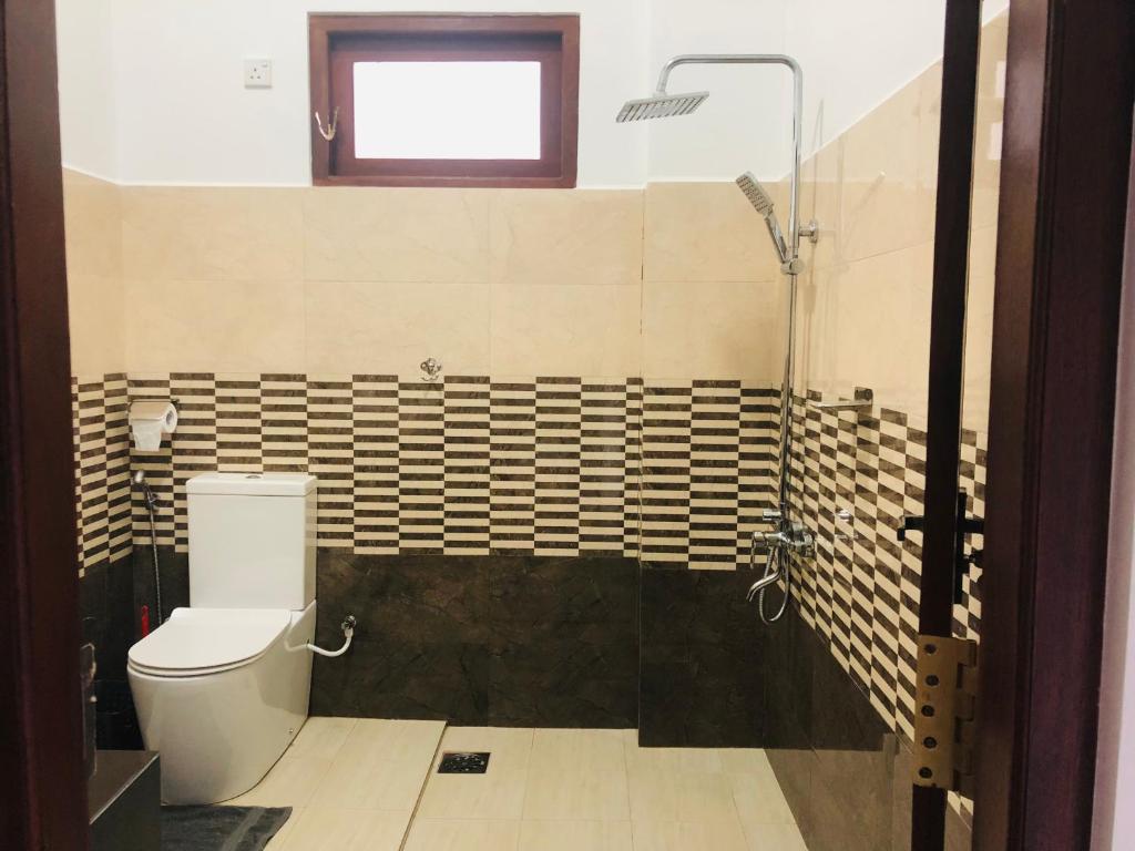 Koupelna v ubytování Relax Inn
