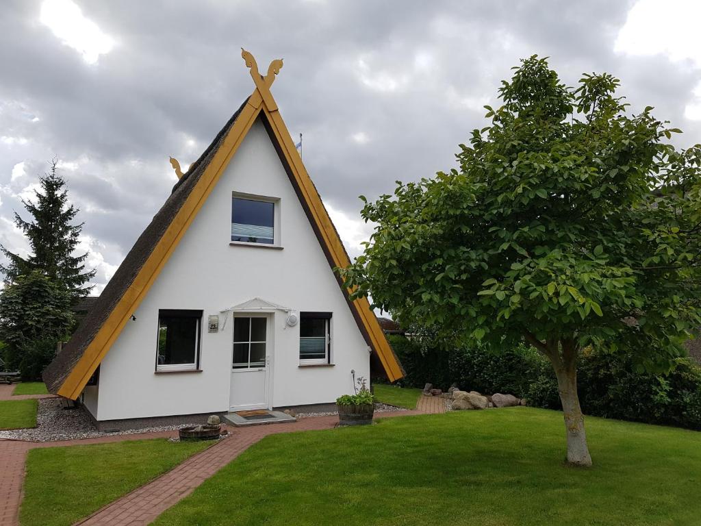 O grădină în afara Ferienhaus Ankerplatz In Börgerende Rethwisch