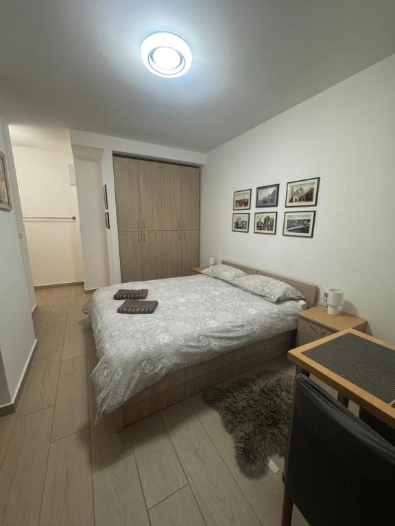 Postel nebo postele na pokoji v ubytování Miriam Rooms Zadar