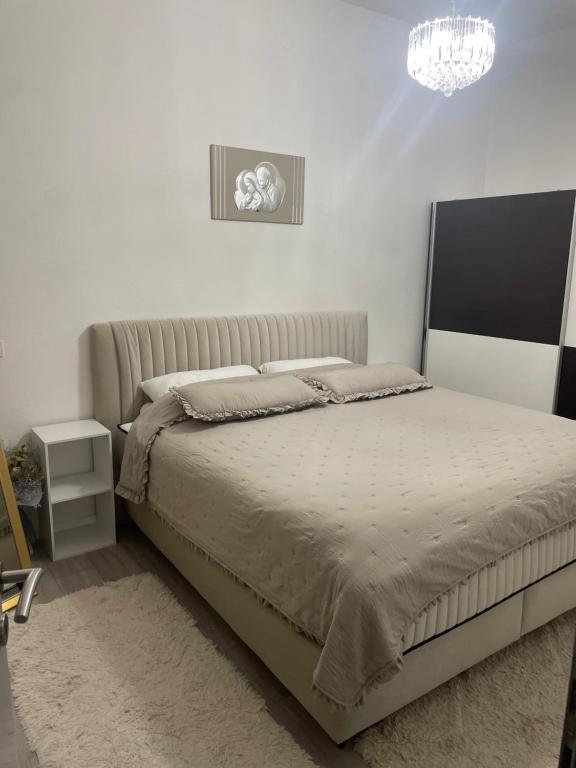 Posteľ alebo postele v izbe v ubytovaní Angelo's Apartments