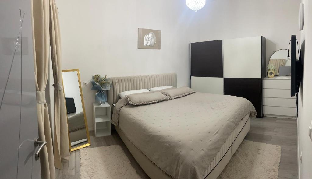 Posteľ alebo postele v izbe v ubytovaní Angelo's Apartments