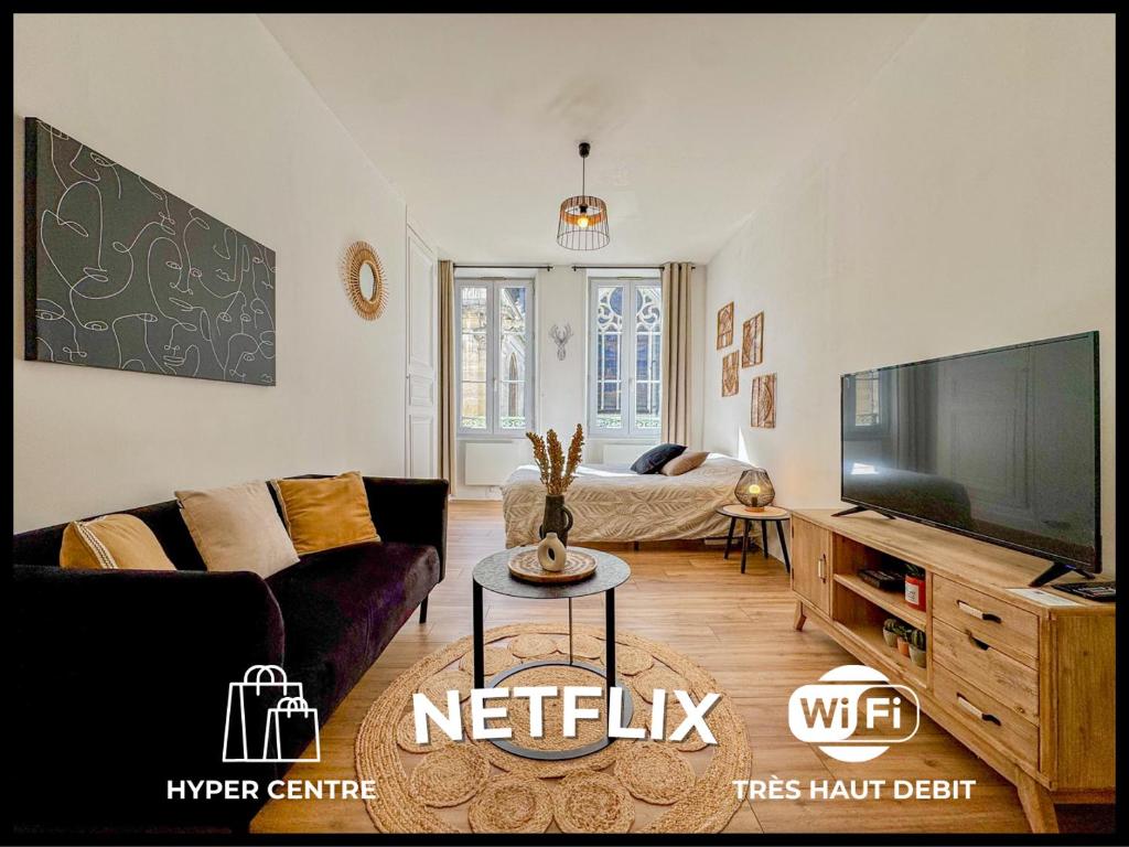 TV a/nebo společenská místnost v ubytování Ô Centre- Chaleureux - Fibre - Netflix