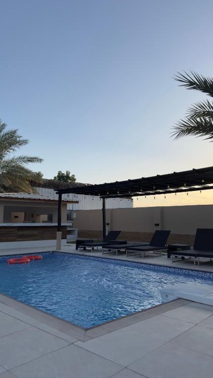 Bazén v ubytování The Inn Nizwa nebo v jeho okolí