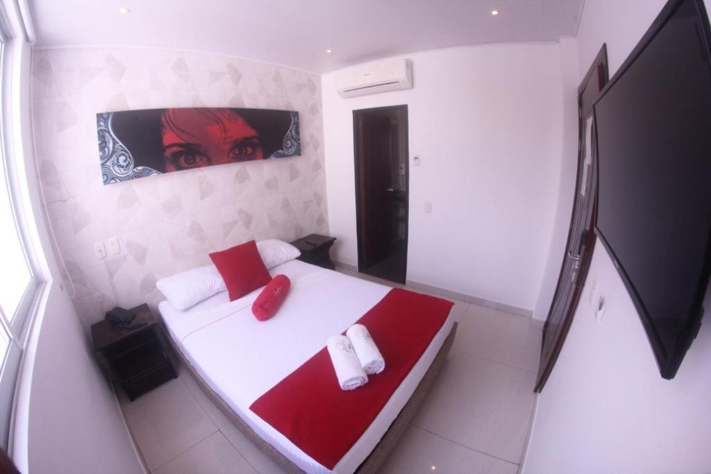 Postel nebo postele na pokoji v ubytování Bora Beach Club