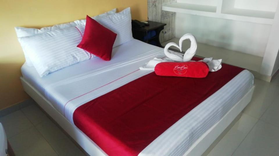 Postel nebo postele na pokoji v ubytování Bora Beach Club