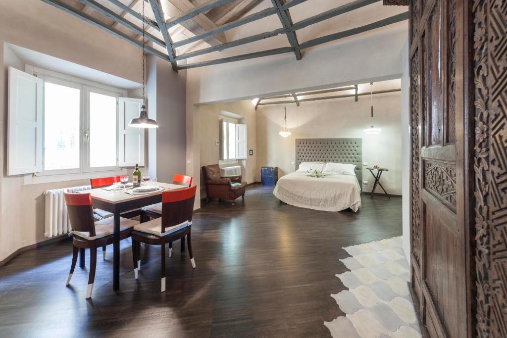 เตียงในห้องที่ Firenze Rentals Accademia