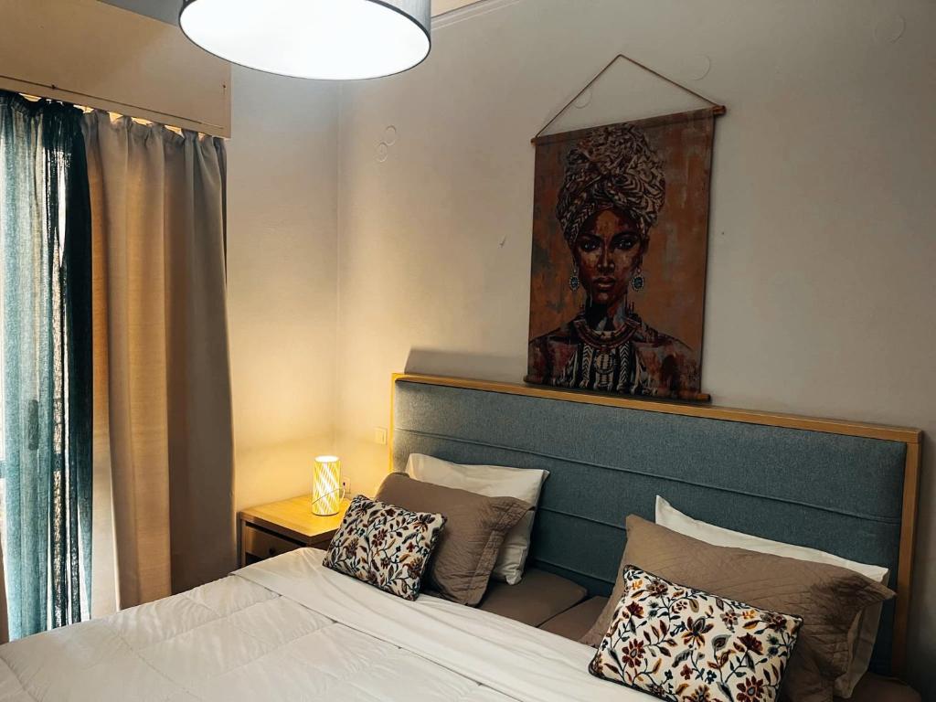Posteľ alebo postele v izbe v ubytovaní Cozy apartment in centre of Heraklion