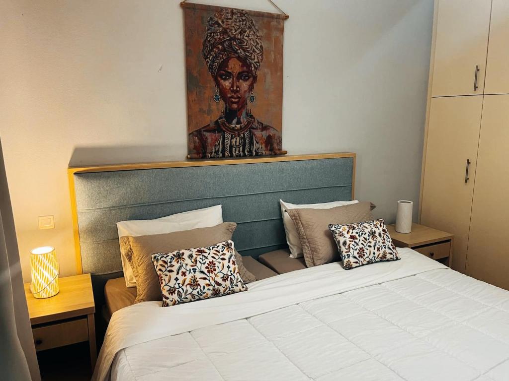 Posteľ alebo postele v izbe v ubytovaní Cozy apartment in centre of Heraklion
