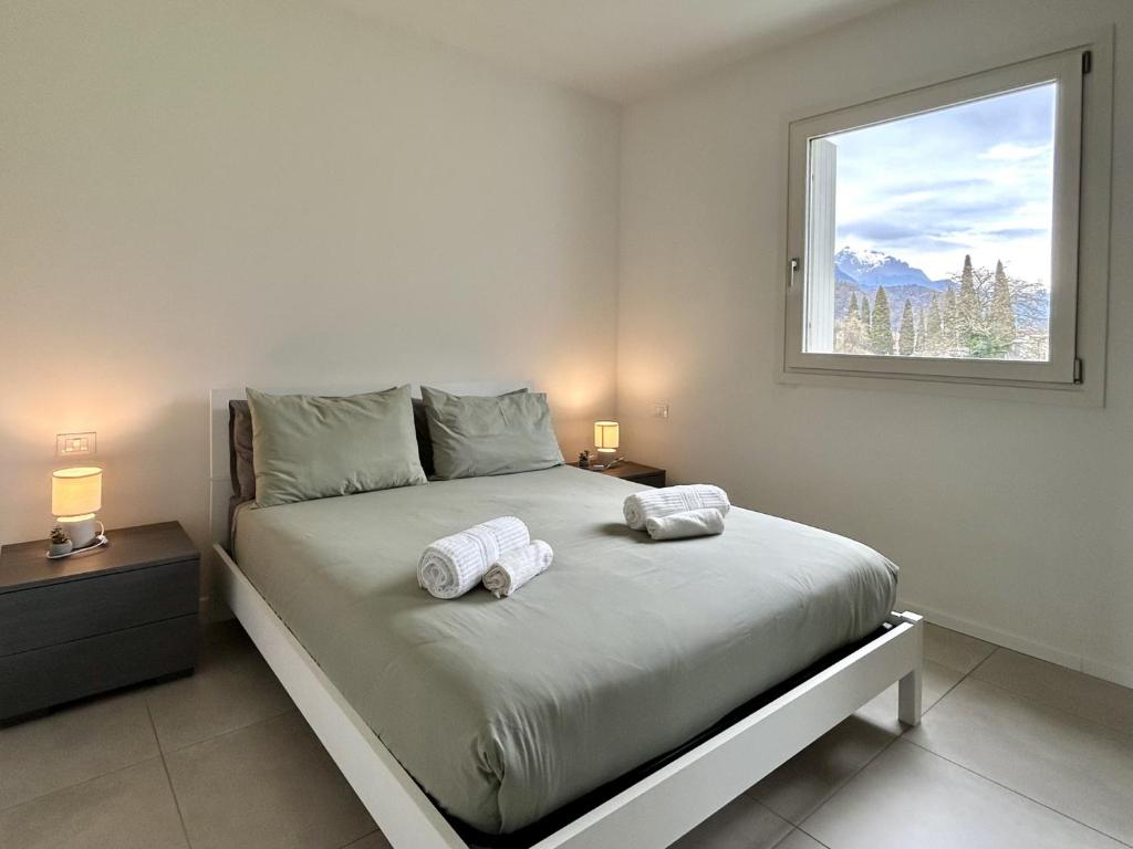 Postel nebo postele na pokoji v ubytování La Rocca - terrazza panoramica