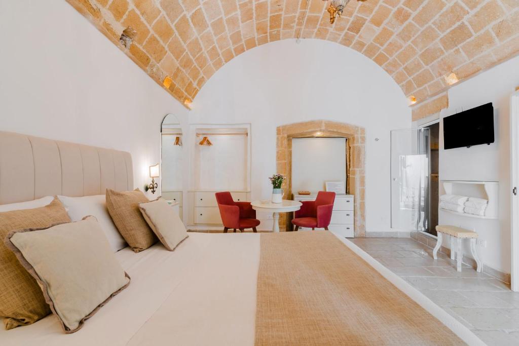TV a/nebo společenská místnost v ubytování Relais La Casa del Poeta