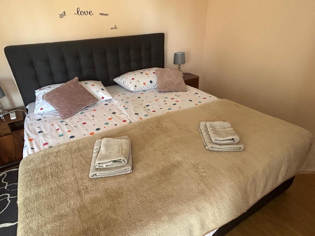 Postel nebo postele na pokoji v ubytování Apartman Luka