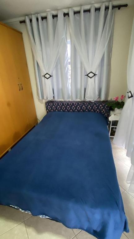 Postel nebo postele na pokoji v ubytování Lar doce lar da Lu
