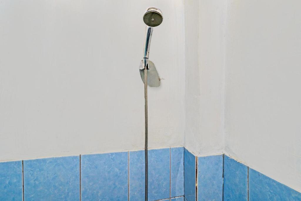 Koupelna v ubytování OYO 92269 Arjuna Homestay