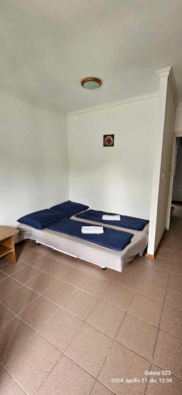 Postel nebo postele na pokoji v ubytování Dömös Danu Kemping