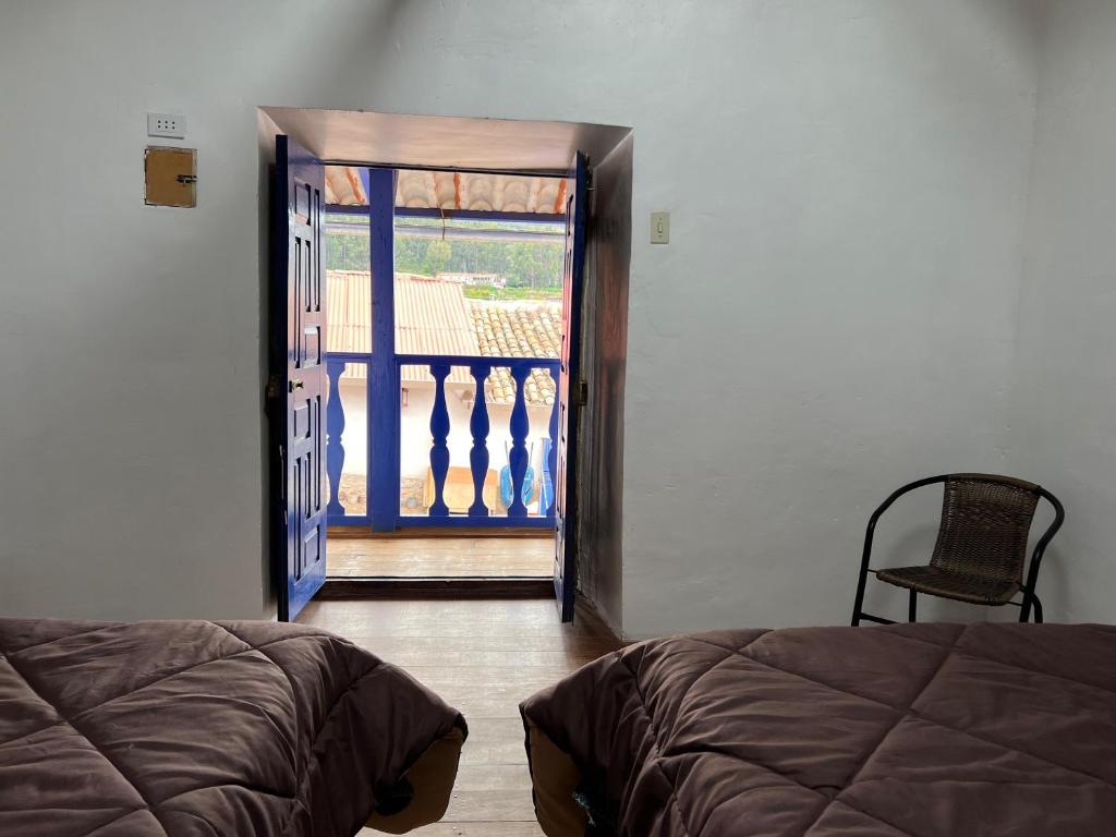 Postel nebo postele na pokoji v ubytování Auquis Hostel
