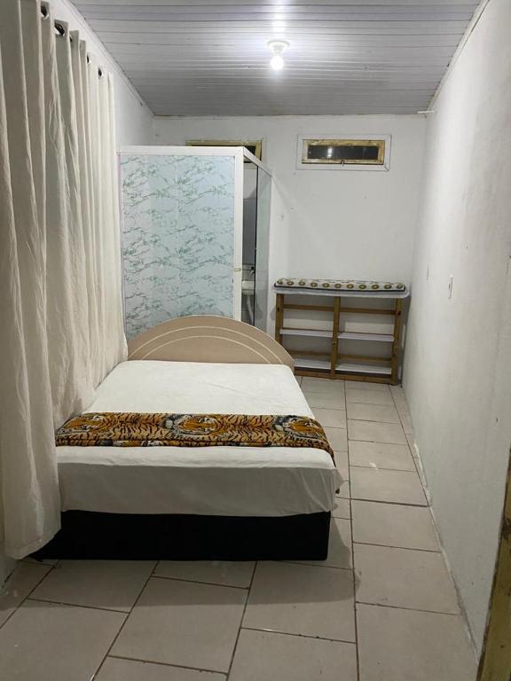 Postel nebo postele na pokoji v ubytování Suites com Wi-fi em Itajai