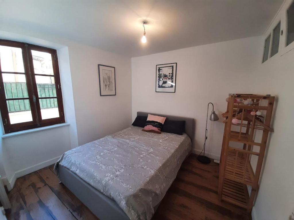 Postel nebo postele na pokoji v ubytování Jolie maison Foix