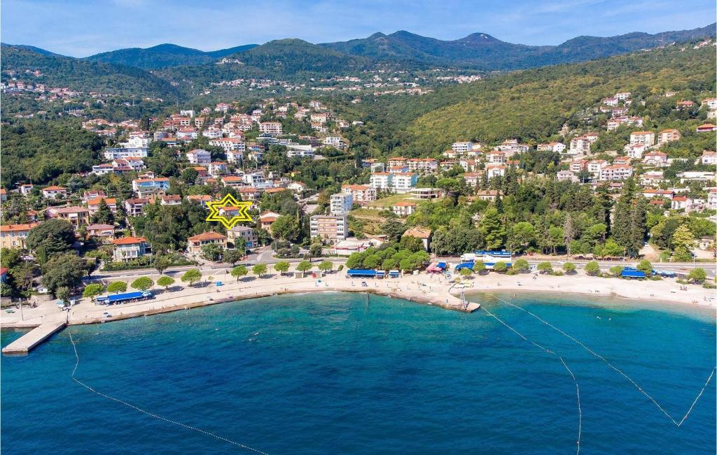 an aerial view of a beach with a resort at Apartment Sea Garden in Ičići