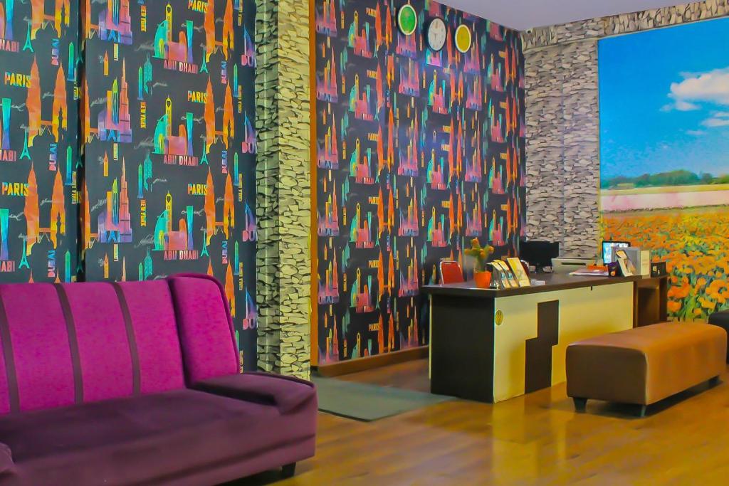 Posezení v ubytování Collection O 92268 Hotel Aero