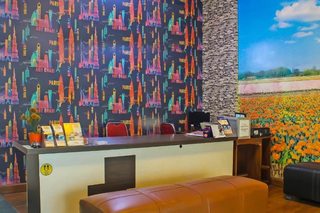 Posezení v ubytování Collection O 92268 Hotel Aero