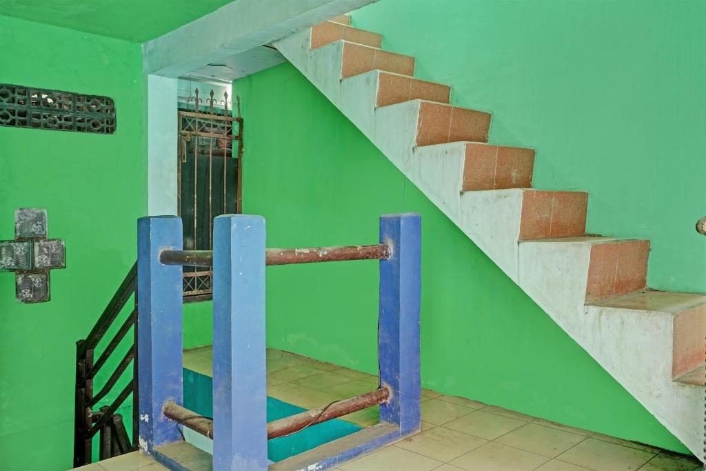 Fotografie z fotogalerie ubytování SPOT ON 92400 Dhaha Penginapan House Syariah v destinaci Kediri