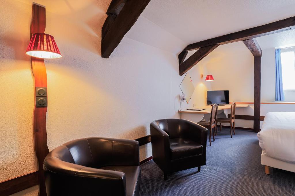 Posezení v ubytování Hôtel Les Trois Luppars