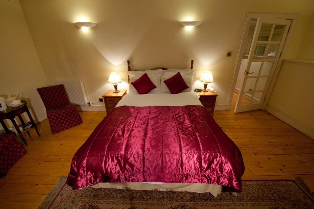 Postel nebo postele na pokoji v ubytování The Ben Doran Guest House
