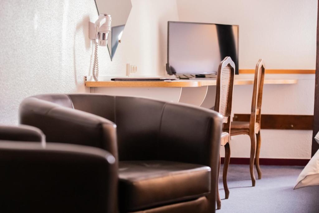 Posezení v ubytování Hôtel Les Trois Luppars